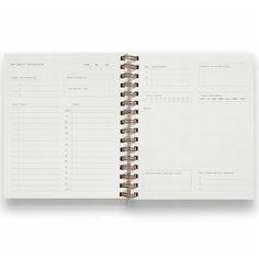 an open planner book with brown pages and numbers on the page, in front of a white background