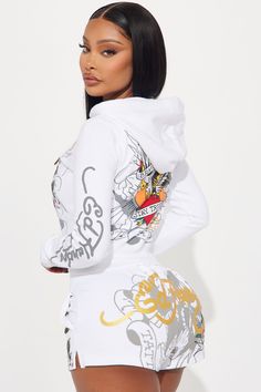 Available In White. Zip Front Hoodie Long Sleeve Ed Hardy Graphic Front, Back, And Sleeve Screen Drawstrings Stretch Pair To "Ed Hardy Brave Eagle Shorts" Disclaimer: Due To The Printing Process A Difference In Saturation May Occur. Each Garment Is Unique. 53% Cotton 47% Polyester Imported | Ed Hardy Brave Eagle Zip Front Hoodie in White size Small by Fashion Nova Fitted White Hoodie For Fall, Fitted White Hoodie For Winter, Fitted White Sweatshirt For Loungewear, Fitted White Sweatshirt For Streetwear, White Fitted Sweatshirt For Streetwear, White Fitted Sweatshirt For Loungewear, Trendy Fitted White Sweatshirt, White Fitted Trendy Hoodie, White Fitted Hoodie