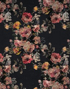 a black floral wallpaper with pink, yellow and red flowers on the bottom half of it