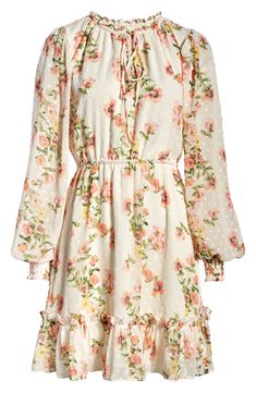 Delightful blooms enliven this soft chiffon mini styled with textured clip dots and fanciful frills. Jewel neck Long sleeves Lined 100% polyester Hand wash, dry flat Imported Elegant Spring Dress With Swiss Dot, Elegant Swiss Dot Dress For Spring, Chic Cream Floral Dress For Garden Party, Feminine Cream Floral Dress With Ruffles, Flowy Cream Dress With Ditsy Floral Print, Feminine Cream Floral Dress For Spring, Feminine Swiss Dot Dress For Brunch, Feminine Swiss Dot Dress For Garden Party, Cream Chiffon Spring Dress