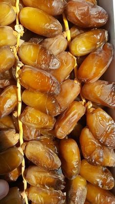 a box filled with dates sitting on top of a table