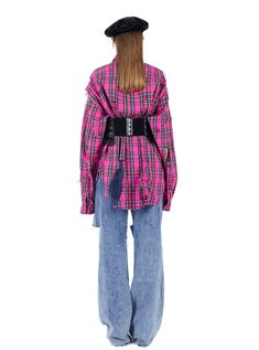 Bold oversized shirt in a vibrant hot pink plaid pattern. Features a classic tartan design with black and green lines creating a striking contrast. The shirt has a relaxed, boxy fit with dropped shoulders for an exaggerated silhouette. Traditional collar and full-length button closure. Long sleeves with buttoned cuffs. The bright color and generous cut make this a standout piece, perfect for grunge or punk-inspired looks. Model info Height: 170cm Weight: 45kg Wearing size: M Oversized Plaid Shirt For Streetwear, Pink Plaid Pattern, Corset Vest, Punk Inspiration, Tartan Design, Tank Top Straps, Pink Plaid, Black Tank, Oversized Shirt