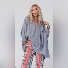 Three Bird Nest - Top Notch Oversized Top - Gray - M Top Notch Oversized Top Is The Perfect Boho Twist To A Classic Button-Up! You're Going To Love Wearing It Because It Features: Oversized, Flowy Silhouette Comfortable, Textured, Non-Stretch, Woven Fabric Exaggerated Henley Neckline Front Closure Mandarin Collar Neckline Cute Pleated Details Along The Shoulders Exposed Seams For Added Style High-Low Bottom Hem Long Balloon Sleeves Yoke Back Detail Go-To Boho Outfit Pair With: Seamless V Neck Br Chic Oversized Tops For Loungewear, Spring Oversized Loose Fit Top, Oversized Loose Fit Top For Spring, Relaxed Fit Gray Top For Beach, Oversized Gray Batwing Sleeve Top, Oversized Gray Casual Blouse, Oversized Fall Top For Brunch, Oversized Tops For Fall Brunch, Casual Oversized Gray Blouse