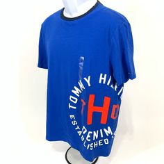 Tommy Hilfiger Denim T-Shirt. Nwt. Medium. Bought For Son Who Had A Major Growth Spurt And Never Got To Wear It. Pet And Smoke Free Home. Relaxed Fit Denim T-shirt With Crew Neck, Trendy Blue Denim T-shirt, Denim Short Sleeve T-shirt For Spring, Trendy Tommy Hilfiger Cotton T-shirt, Blue Short Sleeve Shirt With Text Print, Tommy Hilfiger Relaxed Fit Cotton T-shirt, Casual Denim Blue Short Sleeve T-shirt, Casual Blue Denim T-shirt, Tommy Hilfiger Logo Print T-shirt For Spring