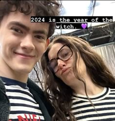 a young man and woman posing for the camera with text that reads, 2012 is the year of the witch