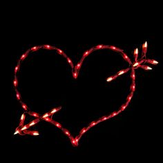 a heart shaped with lights in the dark