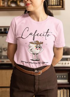 Cafecito porque adulting ta'cabron shirt, Latina shirt, Latina gift, Spanish shirt, Spanish gift, Regalos en español, Funny Spanish, Spanish The unisex soft-style t-shirt puts a new spin on casual comfort. Made from very soft materials, this tee is 100% cotton for solid colors. Heather colors and sports grey include polyester. The shoulders have twill tape for improved durability. There are no side seams. The collar is made with ribbed knitting to prevent curling damage.  .: Made with 100% ring- Coffee-colored Cotton Top For Gift, Coffee Color Cotton Top As Gift, Coffee Cotton Top For Casual Wear, Casual Tops With Funny Text For Gifts, Casual Shirt With Funny Text As Gift, Spanish Club Shirts, Cute Spanish Teacher Shirts, Funny Spanish Shirts, Spanish T Shirt