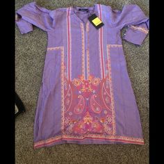 Pakistani Top Brand New Size Medium Brand Khaadi Spring Multicolor V-neck Kurta, Summer Silk V-neck Kurta, Fitted V-neck Printed Kurta, Festive Purple Tunic Dress, Elegant Summer Kurta, Pink V-neck Kurta For Spring, Bohemian Purple Tunic For Spring, Purple Bohemian Tunic For Spring, Festive Spring Silk Tunic