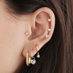 Silver Gold Earring Stack, Silver And Gold Piercings, Mixed Gold And Silver Ear Piercings, Gold And Silver Jewelry Together Ear, Mix Gold And Silver Earrings, Mixed Metal Earscapes, Silver And Gold Earrings Mixing, Silver And Gold Earring Stack, Gold And Silver Earring Stack