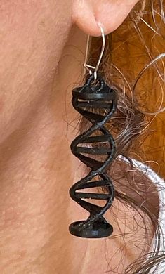 EARRINGS - Double Helix DNA-Shaped, Color - Onyx Black Sparkle. They are Homemade / 3-D Printed, 1-3/4 Inch Long, 1/2 Inch Diameter. The Double Helix Shape of DNA is arguably one of the most esthetically pleasing forms to behold in all of nature. The 3D Printed Material is PLA Plastic (Polylactic Acid Plastic), which is made from Corn, and is Biodegradable. The Ear wires are 100% Brass, with Silver Plating.  The Ear wires are Nickel-Free. Helix Shape, Double Helix, Black Sparkle, Helix, Biodegradable Products, Onyx, 3 D, Halloween Shopping, Jewelry Earrings Dangle