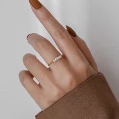 Elegant White Hypoallergenic Midi Rings, Everyday Pearl Ring With Charm, Dainty Pearl Drop Ring For Everyday, Minimalist Everyday Rings With Pearl Drop, Dainty Everyday Pearl Ring With Pearl Drop, Dainty Everyday Pearl Drop Ring, Elegant White Midi Rings With Simple Design, Minimalist Adjustable Rings With Pearl Drop, Minimalist Adjustable Ring With Pearl Drop