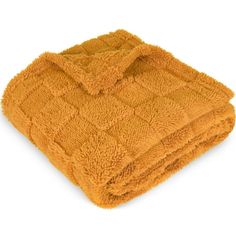 an orange towel folded on top of each other