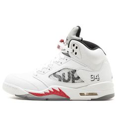 If you're a sneakerhead, then you know that the Supreme x Air Jordan 5 Retro 'White' is one of the most highly anticipated releases of the year. These kicks are the result of a rare collaboration between two of the biggest names in the game, and they definitely don't disappoint. Featuring a reflective silver tongue with '94' branding and 'Sup' lettering on the quarter panel, these kicks are sure to turn heads wherever you go. The white leather upper is mounted atop a matching white midsole with red shark tooth detailing, completed with a black rubber outsole. (AJ5/SNKR/High Top/Basketball) Urban Air Jordan 4 With Boost Midsole For Streetwear, Sporty Air Jordan 4 With Abzorb Midsole For Streetwear, Urban Style White Basketball Shoes, White Urban Jordan Lace-up Shoes, Air Jordan 4 Mid-top White Sole For Streetwear, Sporty Air Jordan 4 With Abzorb Midsole, Air Jordan 4 White Sole Lace-up For Streetwear, White Urban High-top Sneakers For Streetwear, Air Jordan 4 Boost Midsole High-top