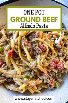 one pot ground beef alfredo pasta in a white bowl