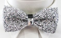 "Beautiful pre-tied and adjustable double tiered banded bow tie Crystal Beaded Will adjust from 13\" through 20\" neck. Bow dimensions 2.5\" x 4.5\". Bow tie Always made by hand and to your special order. Weddings and groups are welcome." Elegant Bow Ties For Party, Party Bow Tie With Ribbon, Adjustable Decorative Bow For Black-tie Events, Adjustable Ribbon Bow For Party, Elegant Silver Bow For Party, Silver Satin Bow For Party, Silver Satin Party Bow, Silver Party Bow Tie, Adjustable Decorative Bow Tie For Party