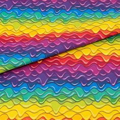 a multicolored fabric with wavy lines on the top and bottom, in different colors