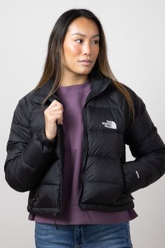 This The North Face Hydrenalite Down Jacket for Women in Black features non-PFC durable water-repellent (DWR) finish that sheds moisture to keep you dry and a relaxed fit. Perfect for fall weather! Features: The North Face Style: NF0A88Z1-JK3 Color: TNF Black 100% recycled nylon taffeta Women’s Jacket Relaxed fit Non-PFC DWR finish for added water repellency Stand collar Center front zip with an internal draft flap Encased, elastic cuffs Exposed, zip hand pockets Internal drawcord with cord locks at hem for adjustability Center Back Length: 19.5" Chest: 22" Machine wash cold, tumble dry low North Face Jacket Colours, North Face Hydrenalite, Face Style, Women In Black, Black Features, Jacket For Women, Fall Weather, North Face Women, Lightweight Jacket