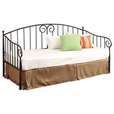 a metal daybed with two pillows and a pillow on the bottom bed, against a white background