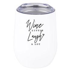 a white wine tumbler with the words wine alltrip laugh on it's side