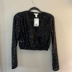 Very Cute & Sexy Brand New Crop Top From H&M Fitted Sequin Top For Going Out, Fitted V-neck Crop Top For Going Out, Glamorous Black Crop Top For Party Season, Fall Evening V-neck Crop Top, Glamorous V-neck Crop Top For Night Out, H&m V-neck Top For Night Out, Glamorous Black Crop Top For Night Out, Black Stretch Crop Top For Party, Black Stretch Crop Top For Party Season