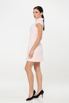 "A pale pink mini dress featuring a frill mock neck, cap sleeves, empire waist, viscose lining, concealed back zipper closure, and a trapeze silhouette. - empire waist - ruffled high neck - short cap sleeves - a line silhouette - concealed back zipper closure - above the knee length (mini) - fully lined Color: pale pink Fiber: 40% viscose, 55% polyester, 5% elastane Lining - 95% viscose, 5 % elastane. For size S: length- 34,5\" (88 cm) Our model wears size S (US 6) and is 171cm/5'6\" tall. You m Feminine A-line Mini Dress, Summer Stretch Mini Dress With Cap Sleeves, Spring Mini Length Short Sleeve Dress, Spring Short Sleeve Solid Color Mini Dress, Spring Short Sleeve Mini Dress In Solid Color, Fitted Mini Dress With Cap Sleeves And Ruffles, Spring Solid Color Short Sleeve Mini Dress, Feminine Stretch Knee-length Dresses, Feminine Ruffled Cap Sleeve Dresses