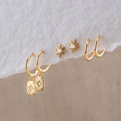 Shine Bright with our Celestial Earrings Gift Set! This handpicked collection features star studs, huggie earrings with charm, and small, simple huggies perfect for second piercings or cartilage accents. Whether you choose a set of two or three, our matching-gift-sets ensure a celestial sparkle that's as unique as you are! - Material: Hypoallergenic, Solid 925 sterling silver and 14 K gold filled finish  - Dimension:  21.5 mm x 5 mm / Huggie inner diameter: 9 mm - Turnaround time: Same day or Ne Double Earring Stack, Cool Earrings Aesthetic, Cute Simple Earrings, Hoop Stack, Jury Duty, Gold Huggies, Double Earrings, Earring Cards, Matching Gifts