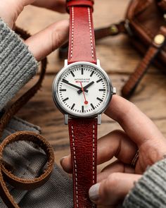 Red Brixham leather strap on Mondaine watch. // WatchGecko

#watches #watchphotography #horology #watch #mensfashion Mondaine Watch, Watch Accessories, Classic Leather, Leather Design, Chronograph Watch