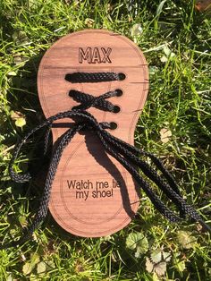 "Help teach your littles how to tie their shoes!  Personalize this piece with their name and your choice of black or white shoe laces. This piece is laser cut out of 1/4\" thick Walnut plywood and sealed with a matte finish. Measures approximately 3.3 in by 6 in.    Each piece of wood differs and no piece is exactly the same.   No returns, exchanges or refunds.   Please let me know if you have any problems, questions or concerns." Learn To Tie Shoes, Tying Laces, Shoe Lacing, How To Tie Shoes, Walnut Plywood, White Shoe, Personalized Shoes, Snowman Ornaments, Tie Shoes