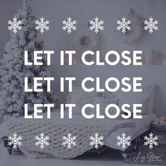 a white christmas tree with snowflakes on it and the words let it close, let it close