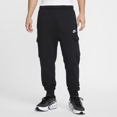 The Nike Sportswear Club Fleece Cargo Pants put an athletic spin on the classic cargo style. Made from soft brushed fabric, they're comfortable for all-day wear. Sportswear Sweatpants With Side Pockets For Outdoor Activities, Black Cargo Joggers Sportswear, Nike Joggers With Pockets For Streetwear, Sportswear Cargo Pants With Pockets, Nike Cargo Pants For Sports, Nike Cotton Cargo Pants For Sports, Nike Sports Bottoms With Cargo Pockets, Nike Sporty Cargo Pants For Sports, Sporty Nike Cargo Pants For Sports