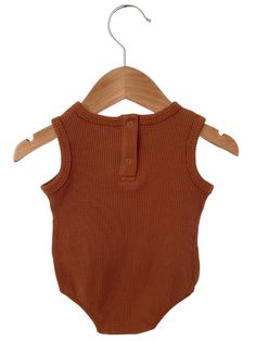 Made from 100% organic cotton, this sleeveless bubble romper is for babies and toddlers to wear on those carefree spring and summer days. The bubble shape means this one-piece can be a complete outfit! The texture of the waffle fabric paired with the beautiful caramel color offers a high-quality and whimsical look for your playful little one. The SpearmintLOVE team carefully crafted this bubble romper with all the small details in mind. The snaps along the inseam and back of neck offer easy diap Brown Sleeveless Bodysuit For Summer, Sleeveless Brown Bodysuit For Summer, Sleeveless Brown Summer Bodysuit, Sleeveless Cotton Onesie For Playtime, Cute Cotton Sleeveless Bodysuit, Cute Sleeveless Cotton Bodysuit, Playful Sleeveless Spring Bodysuit, Spring Sleeveless Playful Bodysuit, Sleeveless Cotton Onesie For Playdate