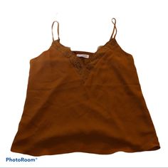 Excellent Used Condition, Beautiful Rust/Burnt Orange Camisole With Lace Detail. Brown Camisole With Tank Straps For Spring, Brown Summer Camisole Cami, Brown Summer Camisole, Brown Spaghetti Strap Tops For Spring, Brown Spaghetti Strap Top For Summer, Spring Brown Camisole, Spring Brown Spaghetti Strap Tops, Brown Spring Camisole, Brown Cami Top For Spring