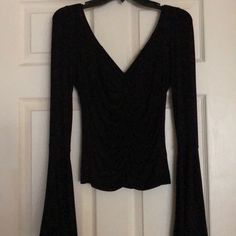 Free People. Black. Bell Sleeve Top. Never Worn! Black Fitted Top For Night Out, Fitted Black Top For Night Out, Black V-neck Top For Night Out, Black Tops For Going Out In Spring, Casual Black Blouse For Going Out, Fitted Casual Tops For Going Out, Black Fitted Top For Evening, Black Fitted Evening Top, Black Fitted Blouse For Going Out