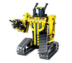 a yellow and black toy bulldozer on a white background