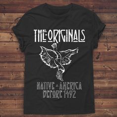 Originals Native America - Rocker Tee — The NTVS | Native American Clothing Native American Tshirt, Fitted Graphic Tee For Concerts, Fitted Band Logo Tops For Streetwear, Fitted Rock Style T-shirt With Crew Neck, Rock Style Fitted T-shirt For Concerts, Fitted Band Merch T-shirt With Logo, Fitted Band Logo T-shirt, Fitted Cotton Rock T-shirt, Fitted Tops For Music Festivals Streetwear