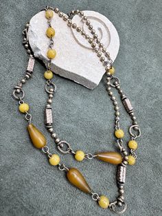 Vintage Art Deco Butterscotch Bakelite Beads and Brass 28 in Necklace . Good vintage condition. Vintage Amber Beads, Gems, And Cabochons, Vintage Amber Beaded Gems And Cabochons, Vintage Yellow Beaded Chain Jewelry, Vintage Yellow Jewelry With Beaded Chain, Vintage Yellow Polished Beads, Port Huron, Brass Necklace, Oct 11, Beaded Necklaces