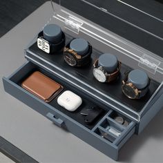 an open drawer with several different items in it