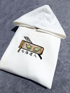 Embrace your love for anime with our custom embroidered sweatshirt! Crafted with high-quality materials and attention to detail, this sweatshirt is perfect for any anime enthusiast. Upgrade your anime-inspired wardrobe with our embroidered sweatshirt today and let your passion for anime shine! Available in sizes S, M, L, and XL, this oversize hoodie ensures a comfortable fit for everyone. Made from a blend of 90% cotton and 10% polyester, it's both soft and durable, perfect for everyday wear. Additionally, our hoodie is machine washable at 30oC, ensuring easy care and maintenance. We offer worldwide shipping with express options available, so you can rock your Anime Embroidered hoodie no matter where you are. If you encounter any issues with your order, please don't hesitate to reach out t Jjk Aesthetic, Nanami Jjk, Custom Embroidered Sweatshirt, Nanami Kento, Hoodies Aesthetic, Trendy Shirt Designs, Aesthetic Hoodie, Anime Merchandise, Anime Hoodie