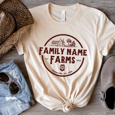 Customize this shirt with your family name, established year, and town of your home / farm. Great gift for newlywed, new home owner, farmer, chicken lover, etc... ❤️Love the design and want it in a sweatshirt? We got you covered. Tap here:  https://cottoncropshop.etsy.com/listing/1682115050/personalized-family-farm-sweatshirts SHORT SLEEVE TSHIRT FIT: ⚡️TAPERED SHOULDERS - so it retains its shape even after washing. ⚡️CREW NECKLINE adds a timeless, classic touch and a neat appearance that is per Family Farm Shirts, Family Farm Shirts Ideas, Farm T Shirt Ideas, Custom Text T-shirt For Family Gatherings, Custom Text Crew Neck Tops For Family Gatherings, Custom Text Crew Neck T-shirt For Family Gatherings, Personalized Cotton T-shirt For Family Gatherings, Funny Farm Shirts, Farm Shirts