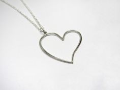 "This Dainty Heart Necklace is a handmade and unique piece. The perfect delicate piece to complement any outfit. This necklace is simply beautiful. We love to use it for couples or as a friendship necklace, it's the perfect piece to express love!❤️ *DETAILS* *Made with: -925 Sterling Silver - -Love *Measurements* - Chain: (16\" standard) -Chain Style: Round Rolo 2 mm. Made in Italy *QUESTIONS?* Any questions that you may have please contact us, we'll be happy to reply, you can send us a message Handmade Minimalist Heart Necklace For Valentine's Day, Simple Heart Necklace, Dainty Heart Necklace, Friendship Necklace, Necklace Love, Friendship Necklaces, Necklace Simple, Valentines Jewelry, Delicate Jewelry