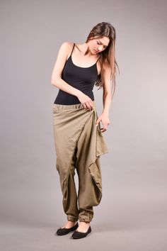 "Linen Harem Pants, Harem Trousers, Baggy Pants, Loose Pants. Extravagant harem trousers with interesting and unusual cut. The baggy pants are loose fit and feature drop crotch. The model is made of linen fabric so it is extremely comfortable women pants suitable for the daytime. If you are looking for the perfect addition to your casual outfit these loose pants are a great choice matched with flats or sneakers. ^ Sizes: The item can be made in sizes from XXS to 7XL. Please, use the size chart b Baggy Khaki Ankle-length Pants, Loosely Fitted Khaki Cargo Pants, Loosely Fitted Hips Khaki Cargo Pants, Stretch Khaki Cargo Trousers, Khaki Baggy Ankle-length Pants, Non-stretch Khaki Tapered Leg Pants, Versatile Baggy Cotton Pants, Loose Fit Full Length Khaki Pants, Stretch Khaki Straight Cargo Pants