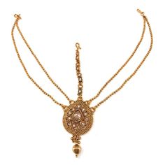 Traditional Indian bollywood gold plated damini headpiece hair ornament in teardrop shape with drop bead and 2 chains on either side attached with fish hooks to complete and enhance the look. Metal: Alloy Plating: 5K (1gm) Gold Stone: Cubic Zircon Material: Glass | Middle Ornament Width: 1.25 Inch Length: 2 Inch Side Multiple Chain Length: 6.5 Inch including fish hook Middle Chain Length: 3 Inch including fish hook. Traditional Indian bollywood gold plated damini headpiece hair ornament in teard