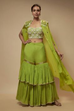 Green cape embellished by sequin bead embellishments. Comes with floral pearl embellished inner blouse and gharara. - Aza Fashions Traditional Georgette Sets With Ruffles, Anarkali Georgette Palazzo Set With Ruffles, Traditional Semi-stitched Anarkali Set With Ruffles, Bollywood Style Palazzo Set With Ruffles In Georgette, Designer Ruffle Sets For Eid, Anarkali Palazzo Set With Ruffles For Festivals, Diwali Anarkali Palazzo Set With Ruffles, Designer Ruffled Sets For Navratri, Pista Green Chinon Sharara With Traditional Drape