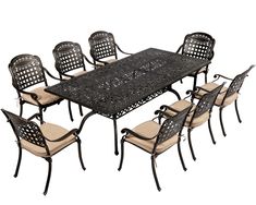 an outdoor dining table with eight chairs and a black wrought iron design on the top