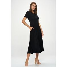 Our Jenesis T-Shirt Dress is perfect for both casual and dressier occasions with its relaxed yet flattering silhouette. Whether you're heading out for a casual brunch date or running errands, this short sleeve t-shirt midi dress with pockets is your go-to choice. Pair it with sneakers or sandals for a laid-back look or dress it up with heels and accessories for a more sophisticated ensemble. Made in USA. Material: 95% Rayon Modal 5% Spandex. Machine washable. Short Sleeve Midi Dress Casual, Casual Black T-shirt Dress For Fall, Casual Long Sleeve Midi Dress For Brunch, Casual Knee-length Midi Dress For Brunch, Fitted Knee-length T-shirt Dress, Casual T-shirt Dress For Summer Workwear, Chic Spring Midi Dress With Crew Neck, Trendy Black Midi Dress With Short Sleeves, Casual Black Midi Dress For Day Out