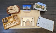 the contents of an assortment of wooden toys on a table with pictures and other items