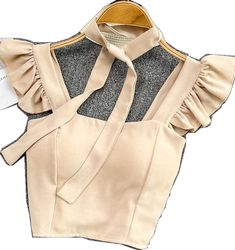 Fitted Sleeveless Beige Crop Top, Beige Fitted Sleeveless Crop Top, Trendy Beige Vest Crop Top, Beige Stretch Vest Crop Top, Beige Stretch Vest Top, Beige Stretch Top For Party, Beige Vest Crop Top For Spring, Trendy Beige Summer Vest, Trendy Beige Party Top