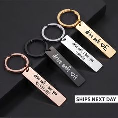 four different styles of keychains with the words alive save and one that says i love you