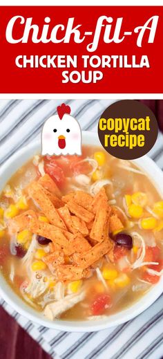 chicken tortilla soup with corn and carrots in a white bowl on a striped tablecloth