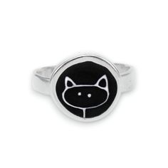 An adorable black cat ring made with enamel and sterling silver. This handmade ring uses sterling silver and enamel that has been fired at 1400 degrees in a kiln. Available in whole sizes 6 through 9. Made to last a lifetime! Shipped as a gift using first class mail with no receipt and in a cute box. To see my entire store go here:  https://www.etsy.com/shop/marmar To see my gemstone and modern store go here: https://www.etsy.com/shop/marmarModern To see my pewter and glass store go here: https: Silver Sterling Enamel Ring With Black Enamel, Silver Sterling Enamel Ring With Black Detail, Adjustable Sterling Silver Cat Design Rings, Glass Store, Modern Store, Vitreous Enamel, Cat Ring, Cute Box, Funky Jewelry